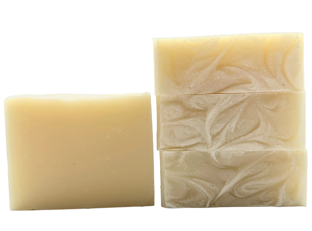 Natural beige handmade soap bars with subtle creamy swirl and minimalist clean aesthetic