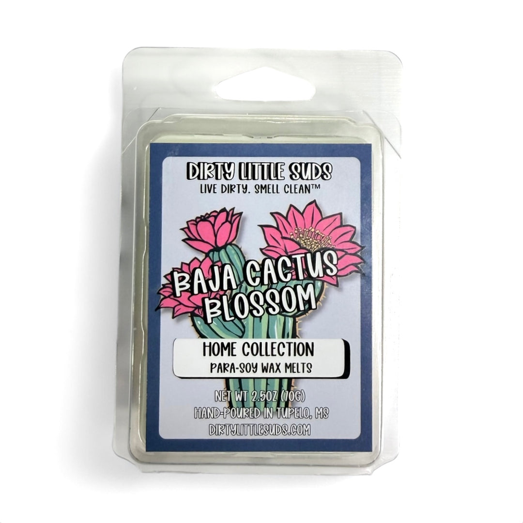 Clamshell pack of Dirty Little Suds Baja Cactus Blossom wax melt with a retro-inspired label. A fresh, floral fragrance of cactus flower, sweet coconut, and soft musk for a bright yet smooth scent that feels like sunshine after rain. 🌞🌵