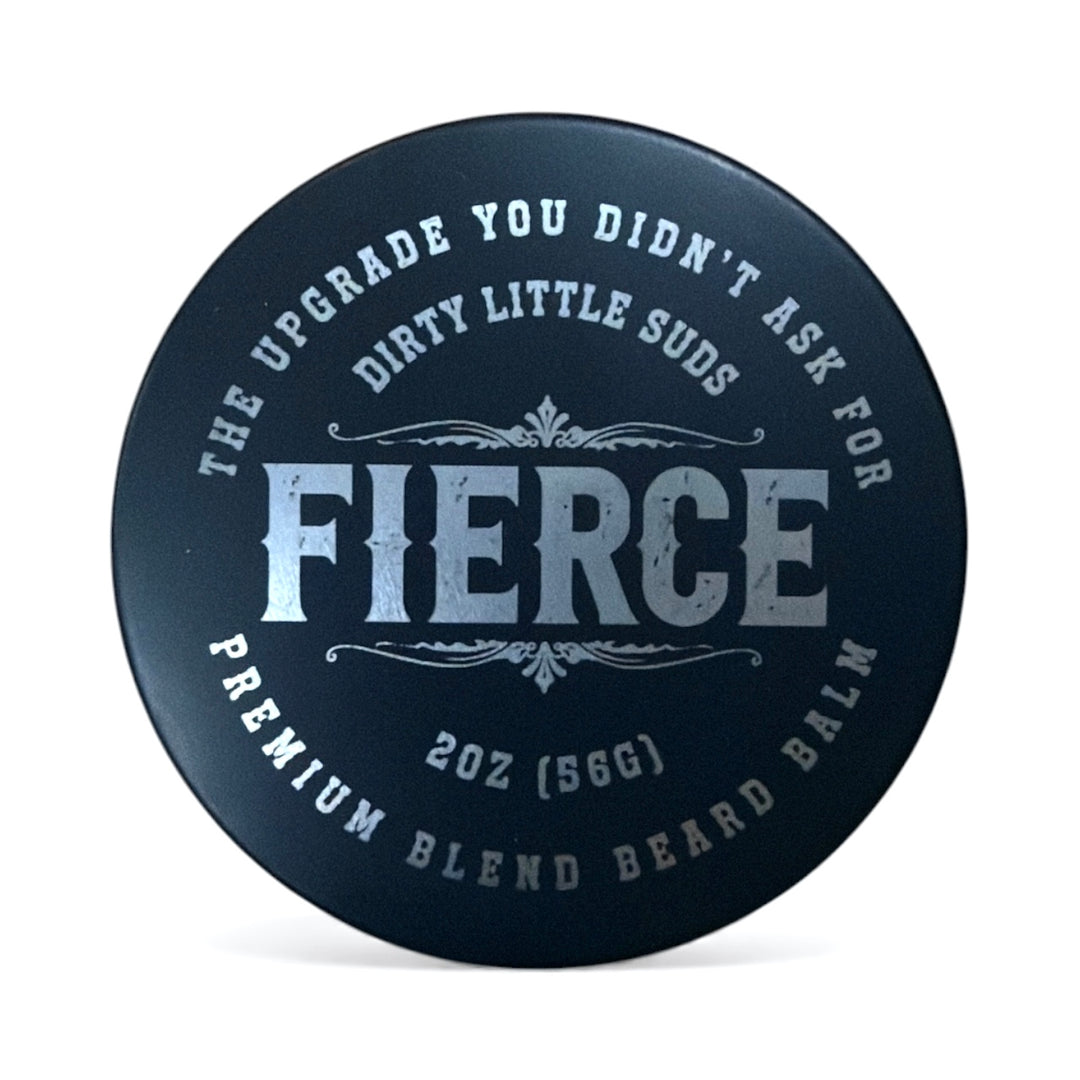 Dirty Little Suds Fierce Beard Balm tin in matte black finish. Bold citrus and wood scent in a non-greasy balm built to shape, condition, and control men’s beards.