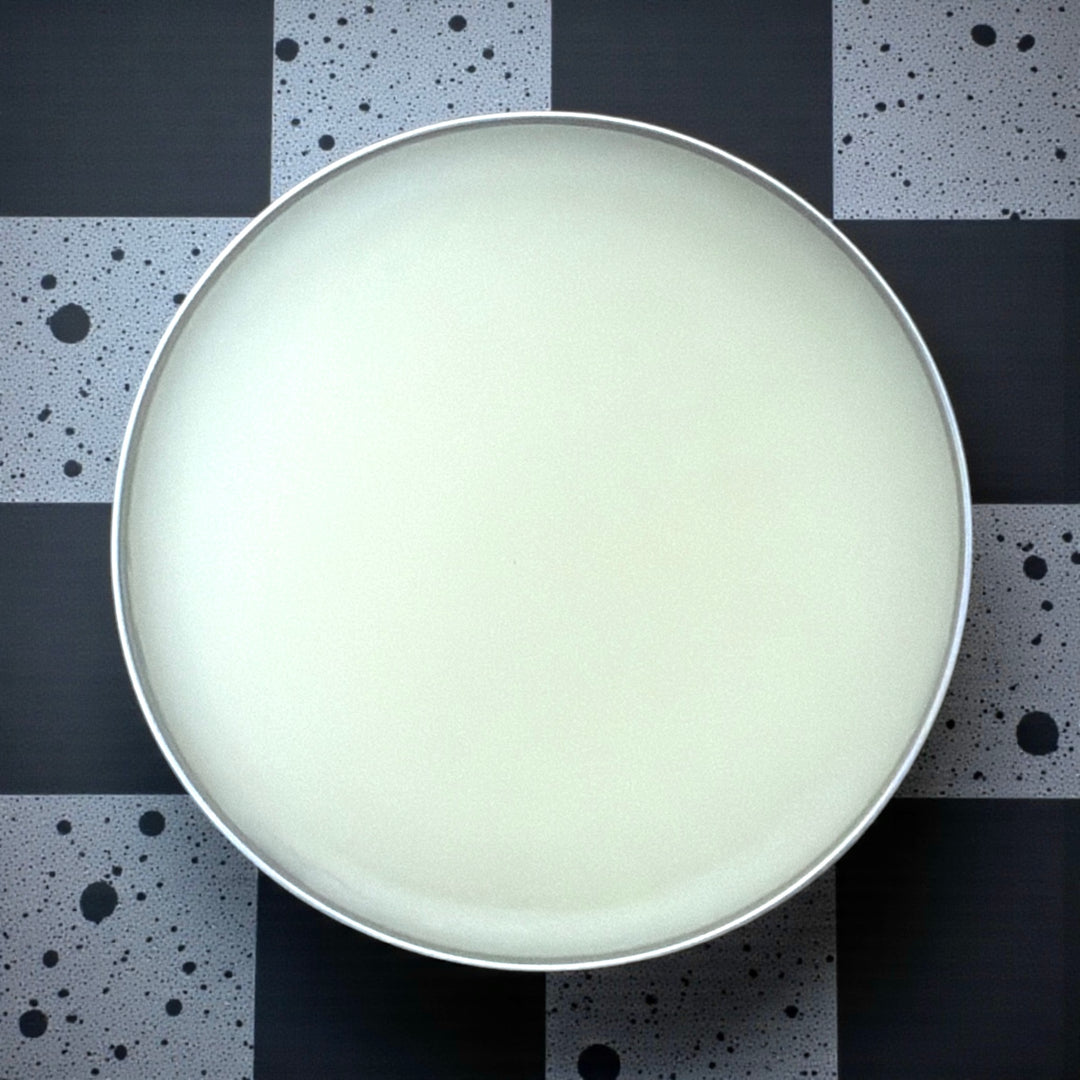 Open tin of Dirty Little Suds Beard Balm showing creamy, smooth texture for easy application and conditioning control of men’s beards.