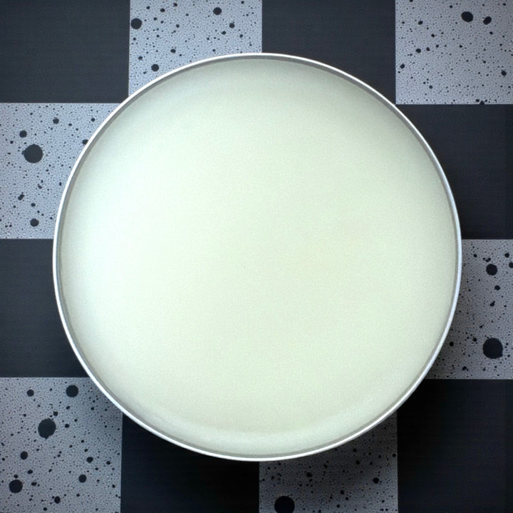 Open tin of Dirty Little Suds Beard Balm showing creamy, smooth texture for easy application and conditioning control of men’s beards.