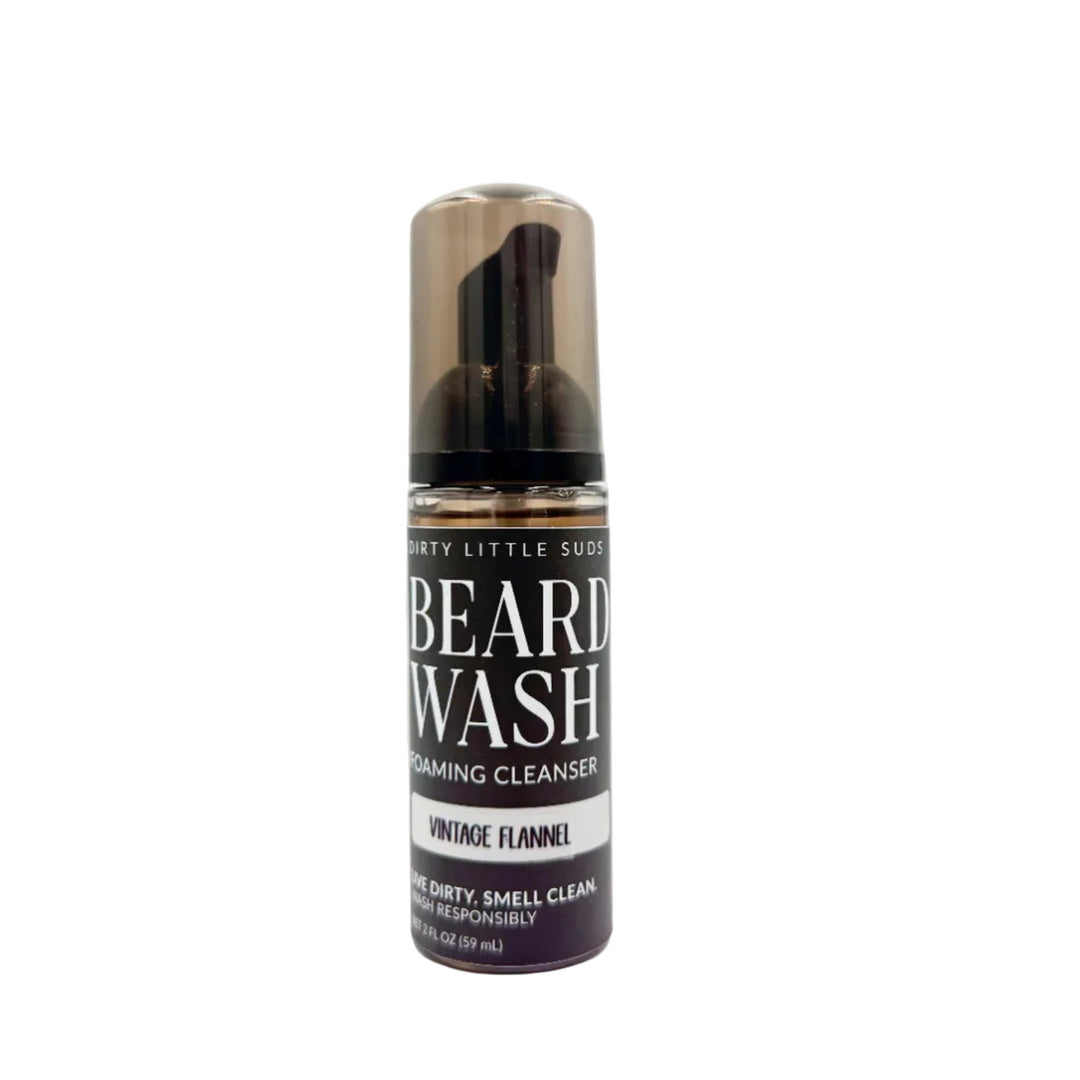 Dirty Little Suds Foaming Beard Wash in a 2 oz black foaming pump bottle.