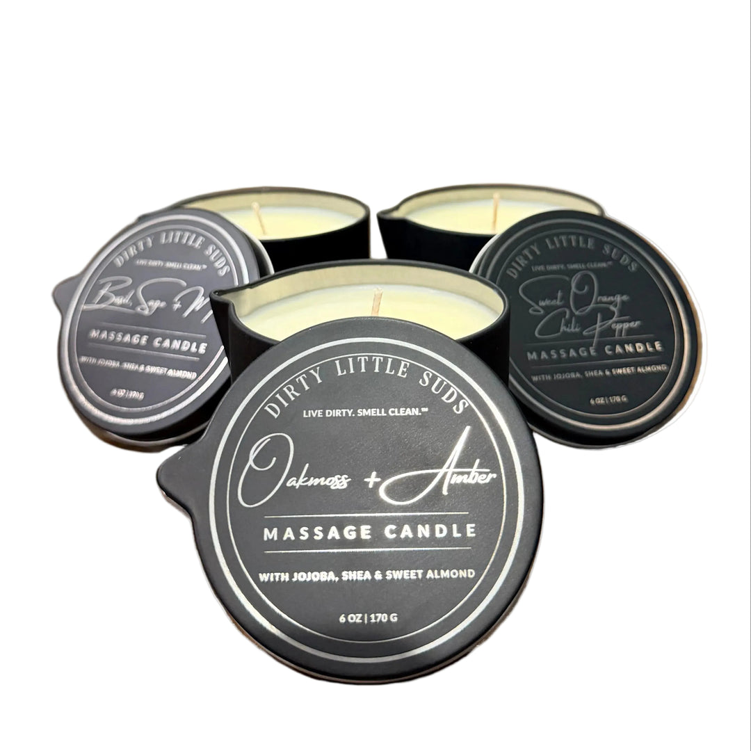 Dirty Little Suds 6 oz massage candles with pour spouts in Oakmoss + Amber, Basil Sage + Mint, and Sweet Orange Chili Pepper