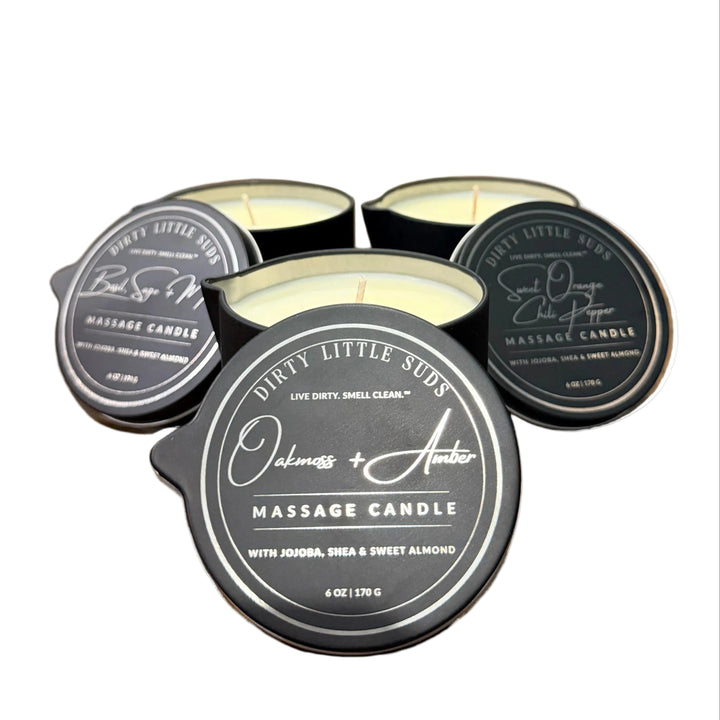 Dirty Little Suds 6 oz massage candles with pour spouts in Oakmoss + Amber, Basil Sage + Mint, and Sweet Orange Chili Pepper