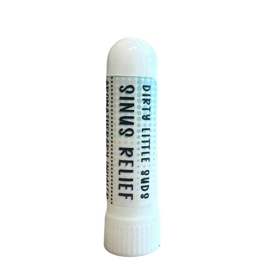 Close-up of Dirty Little Suds Sinus Relief Aromatherapy Inhaler, natural essential oil nasal stick with peppermint, eucalyptus, rosemary, and spearmint oils to support clear breathing.