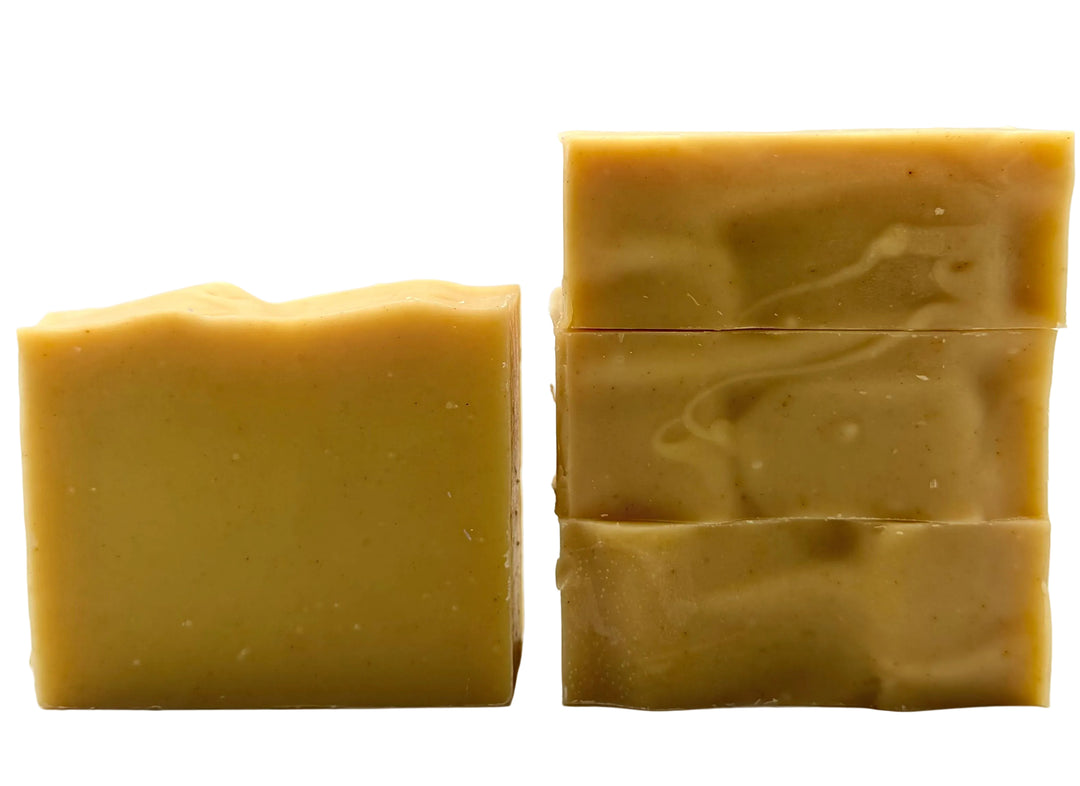 Golden beige handmade soap bars with creamy swirl and warm sunlit color