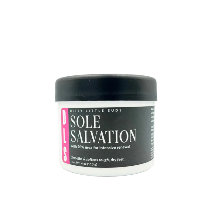 Closed white jar of Sole Salvation 20% Urea Foot Cream with a black Dirty Little Suds label featuring turquoise accents, photographed on a white background.