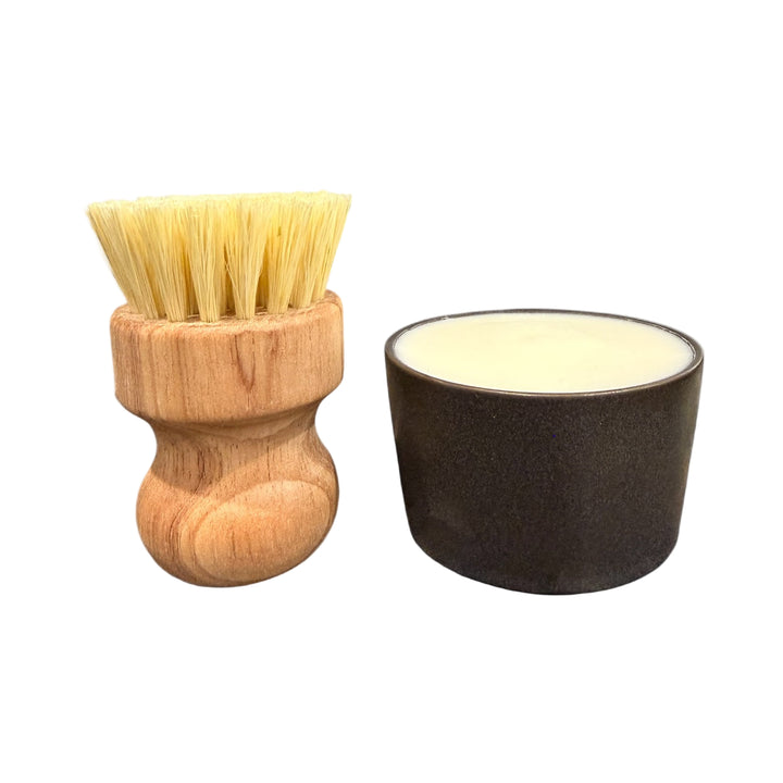Solid dish soap in ceramic ramekin beside wooden dish brush – sustainable, zero waste kitchen cleaning set by Dirty Little Suds