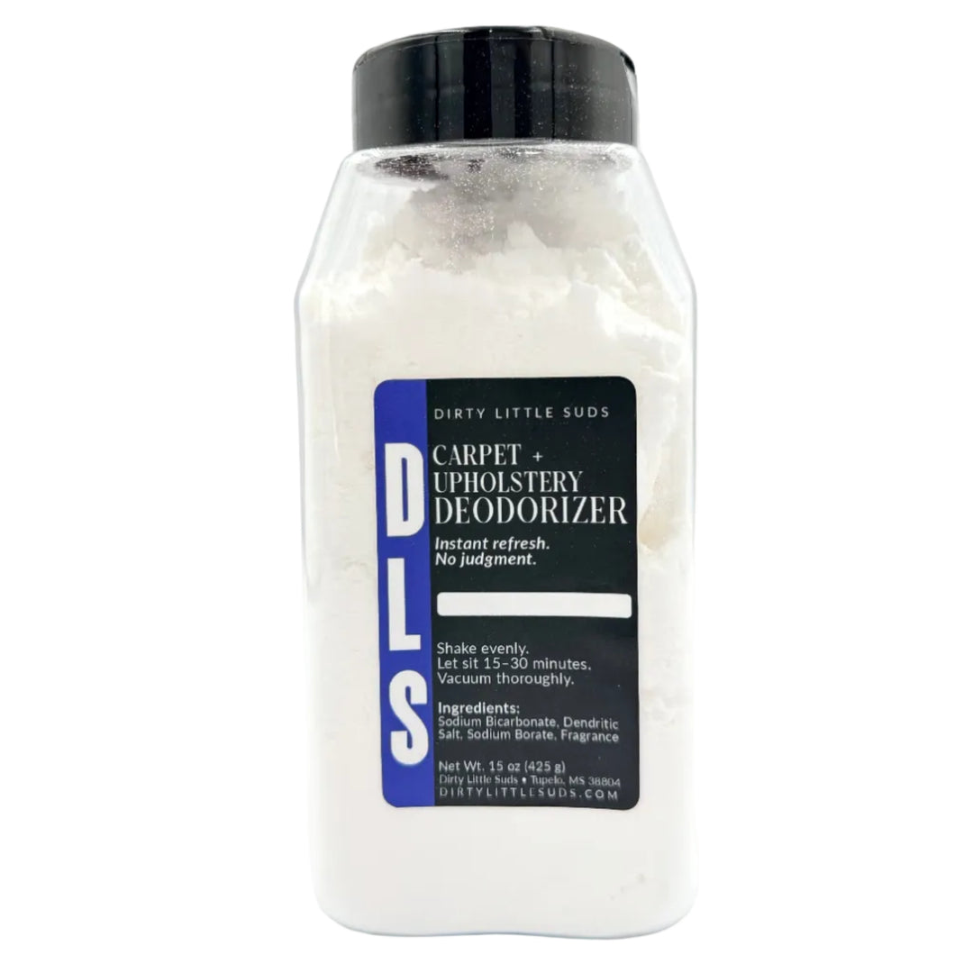 Dirty Little Suds carpet and upholstery deodorizer powder in a 15 oz shaker bottle with black and blue label.