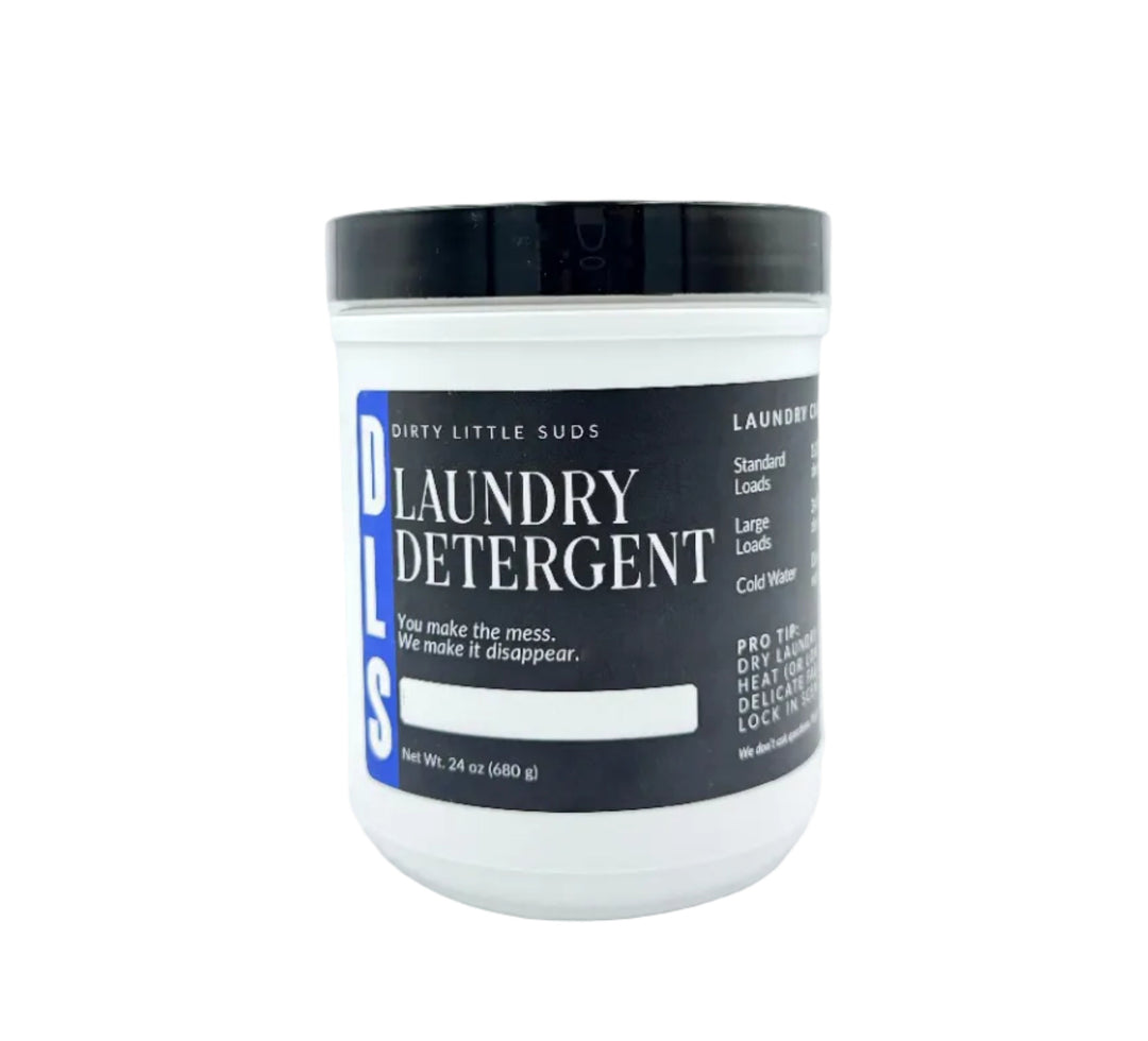 Dirty Little Suds powdered laundry detergent in a 24 oz container with new black and blue label.