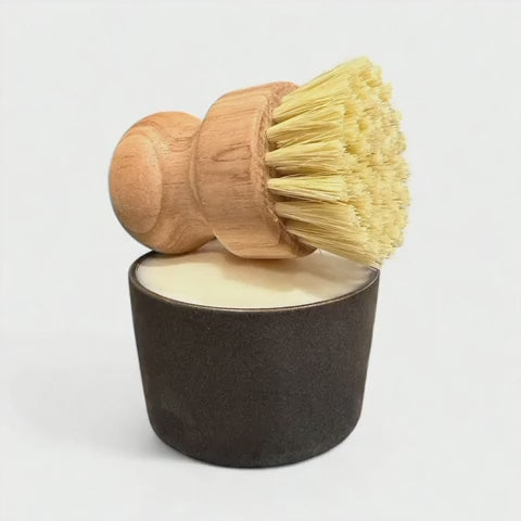 Rotating view of solid dish soap set with wooden dish brush resting on ceramic ramekin – showcases the zero waste, eco friendly kitchen cleaning set by Dirty Little Suds from all angles.